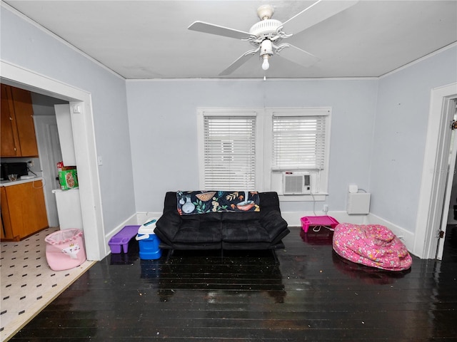 living room featuring cooling unit, ceiling fan, and wood-type flooring