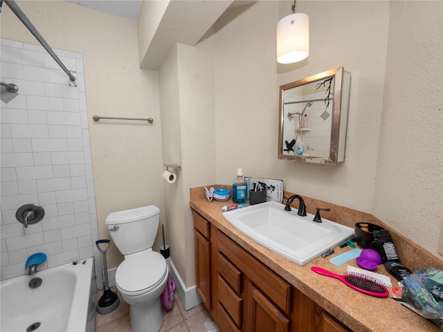 full bathroom with vanity, tiled shower / bath combo, tile patterned floors, and toilet