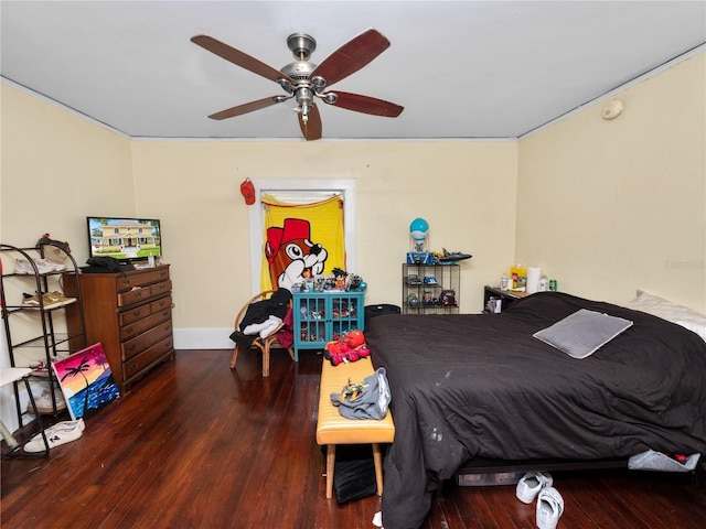 bedroom with dark wood-type flooring and ceiling fan
