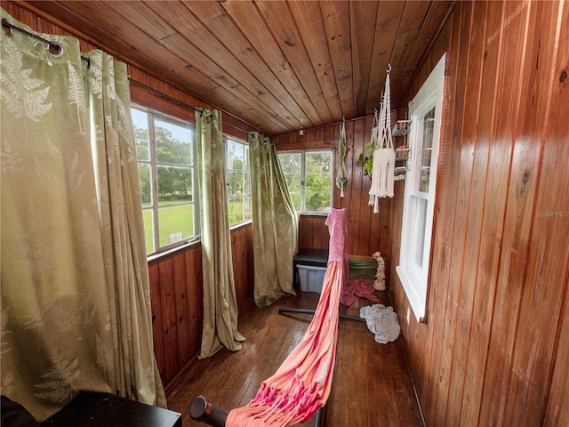 unfurnished sunroom featuring wooden ceiling