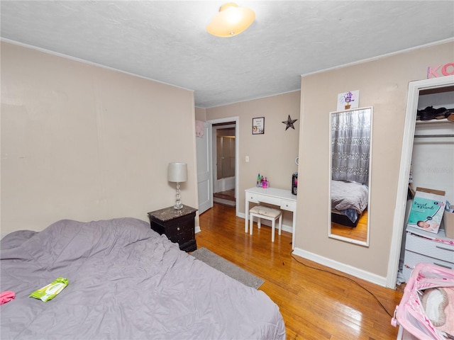 bedroom featuring hardwood / wood-style flooring