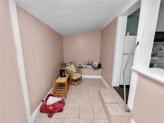 interior space featuring light tile patterned floors