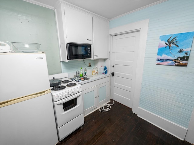 kitchen with white cabinetry, ornamental molding, dark hardwood / wood-style floors, and white appliances