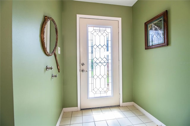 foyer featuring light tile patterned flooring