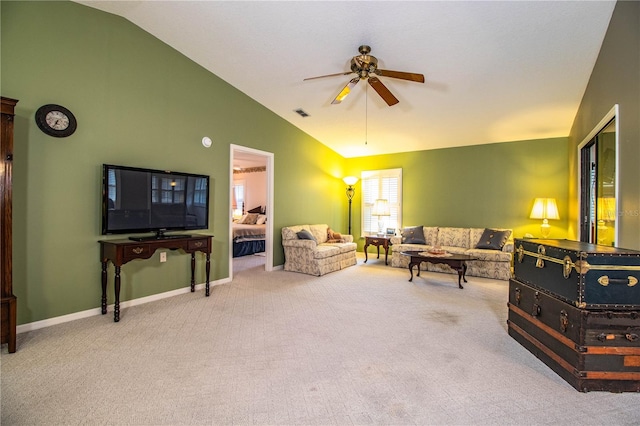 carpeted living room with lofted ceiling and ceiling fan