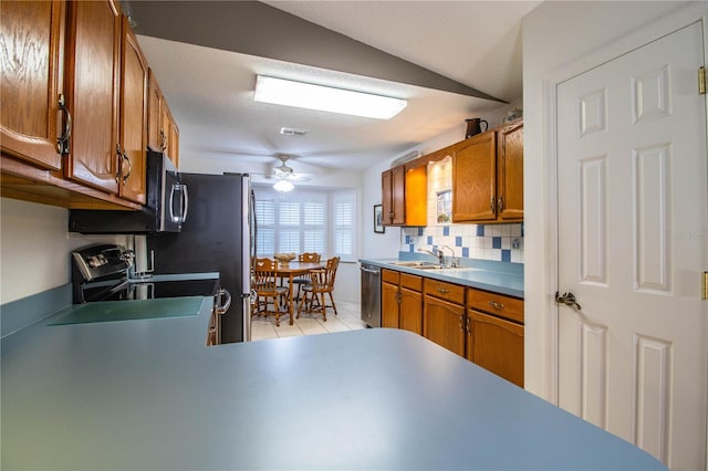 kitchen featuring ceiling fan, dishwasher, light tile patterned floors, electric range, and tasteful backsplash