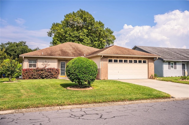 ranch-style house with a front yard and a garage