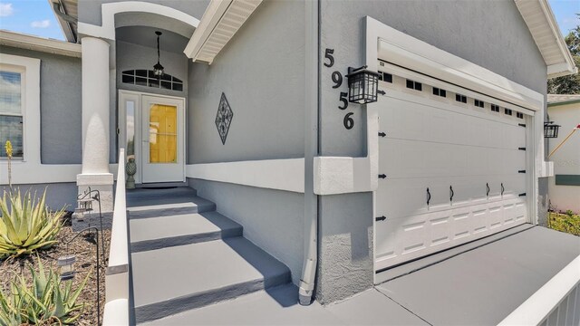 property entrance featuring a garage