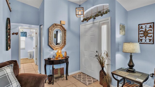 foyer featuring light tile patterned floors