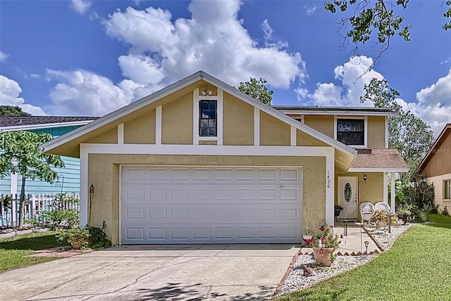 view of front of property with a garage