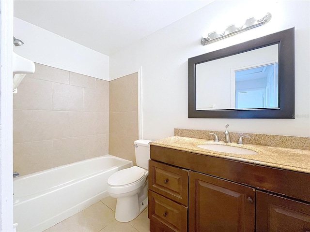 full bathroom with vanity, toilet, tiled shower / bath combo, and tile patterned flooring