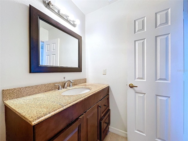 bathroom with vanity and tile patterned floors