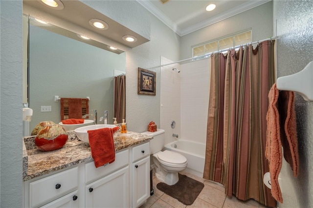 full bathroom featuring shower / bath combination with curtain, ornamental molding, vanity, toilet, and tile patterned floors