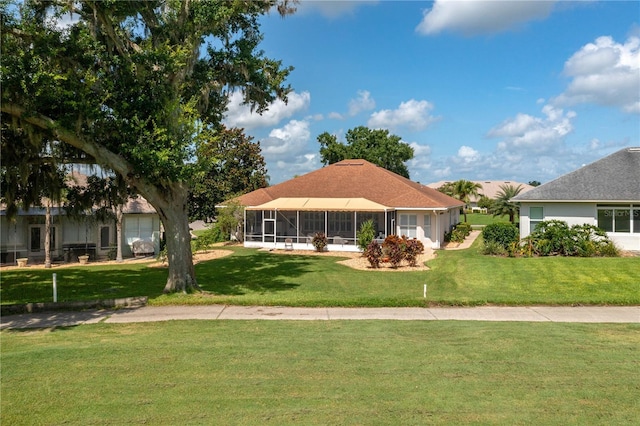 view of front of property with a front lawn