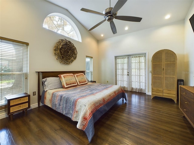 bedroom featuring ceiling fan, high vaulted ceiling, dark wood-type flooring, and french doors