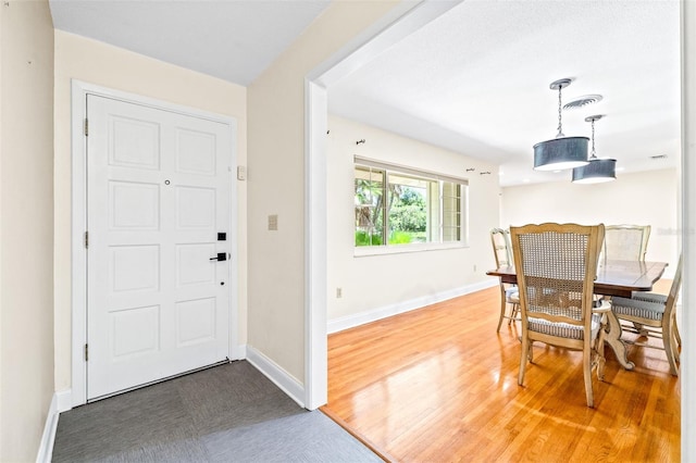 entrance foyer featuring hardwood / wood-style flooring