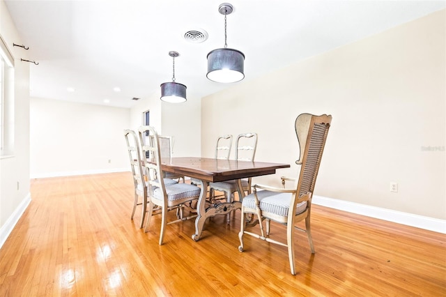 dining room with light wood-type flooring