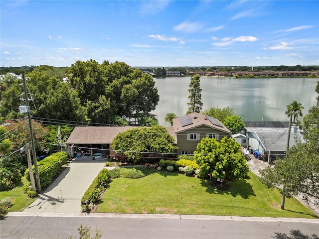 birds eye view of property with a water view