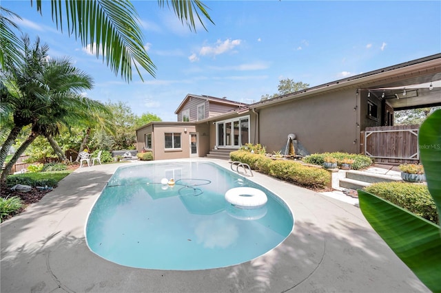 view of pool with a patio