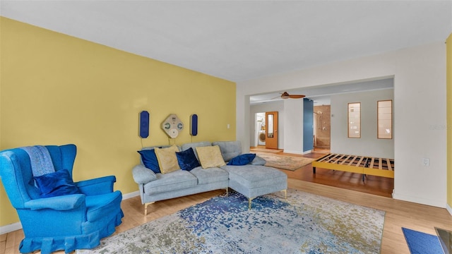 living room with light hardwood / wood-style flooring