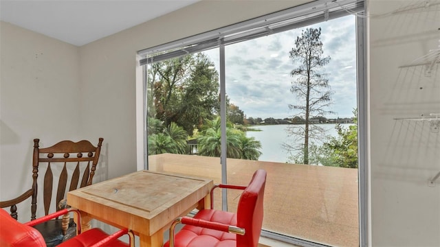 dining room with a water view