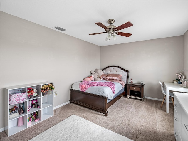 bedroom featuring light carpet and ceiling fan