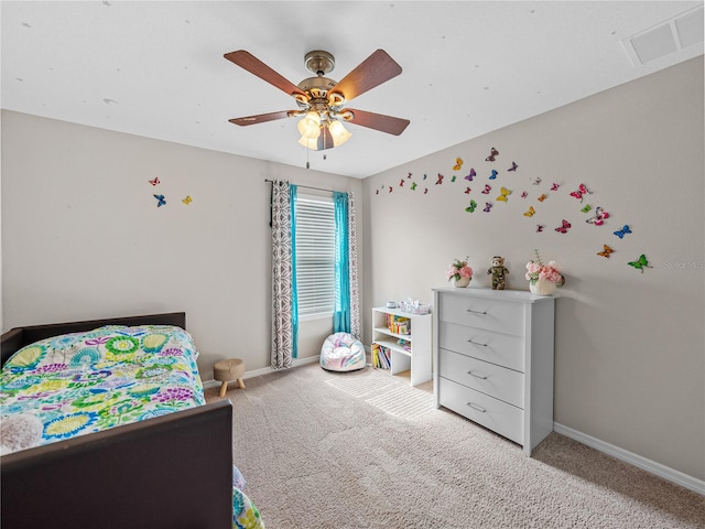 carpeted bedroom with ceiling fan