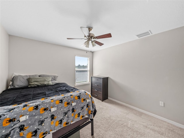 carpeted bedroom with ceiling fan