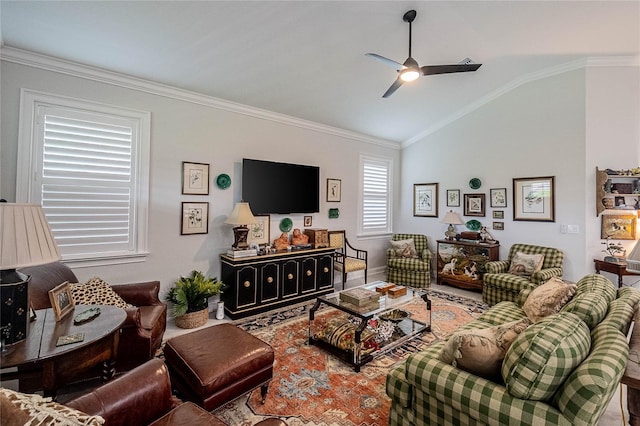 living room featuring vaulted ceiling, ornamental molding, and ceiling fan