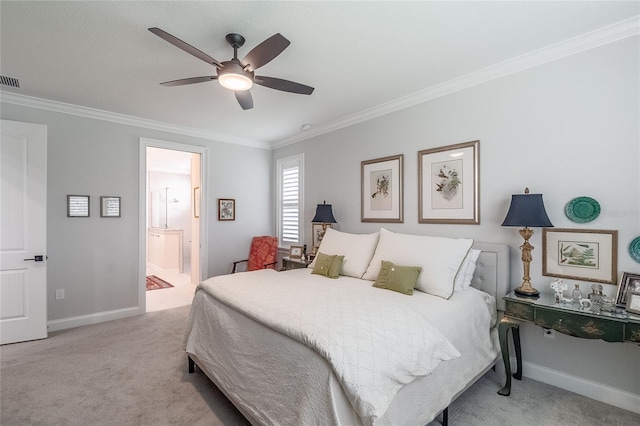 carpeted bedroom with ceiling fan, crown molding, and ensuite bath