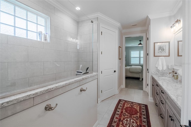 bathroom with vanity, crown molding, tile patterned floors, and walk in shower