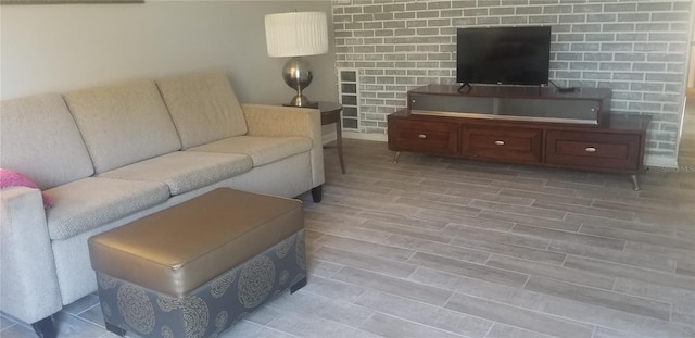 living room with light hardwood / wood-style flooring