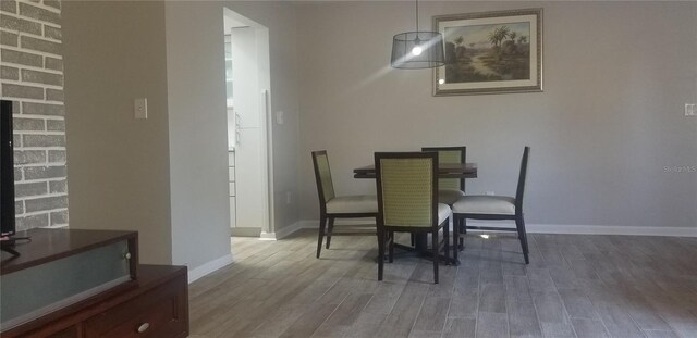 dining room featuring hardwood / wood-style flooring