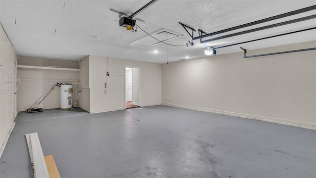 garage featuring electric water heater and a garage door opener