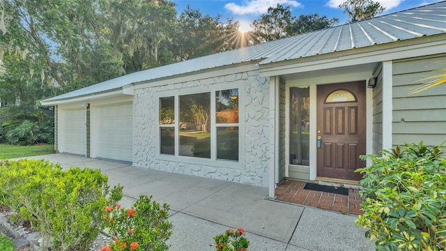 property entrance featuring a garage