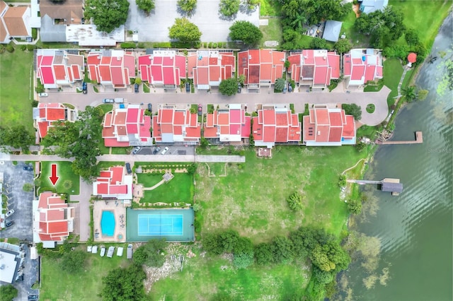 bird's eye view featuring a residential view and a water view