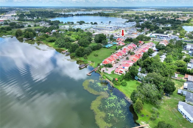 bird's eye view featuring a residential view and a water view