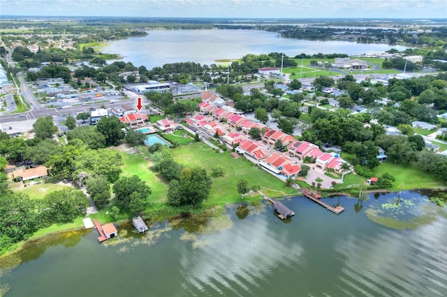 bird's eye view with a residential view and a water view