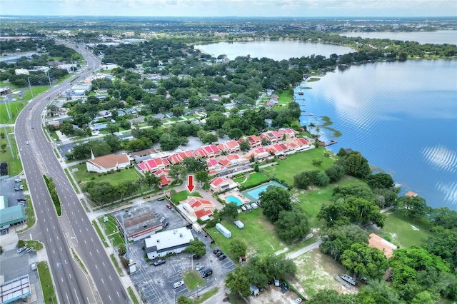 birds eye view of property featuring a water view