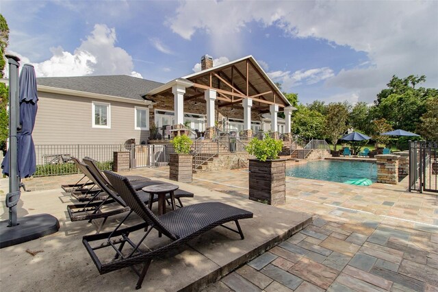 view of patio / terrace featuring pool water feature