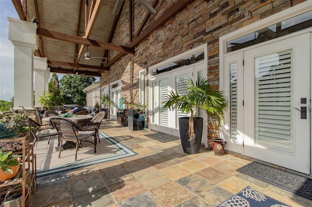 view of patio featuring ceiling fan