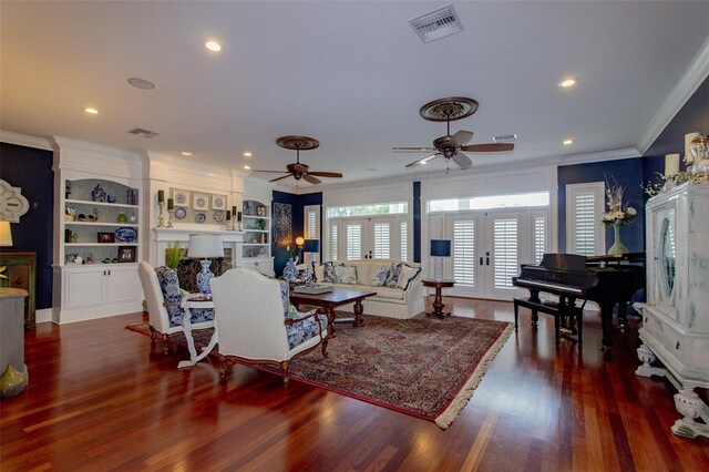 living room featuring ceiling fan, crown molding, dark wood-type flooring, and french doors