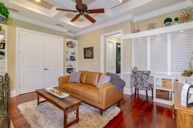 living room with coffered ceiling, ceiling fan, ornamental molding, beamed ceiling, and wood-type flooring