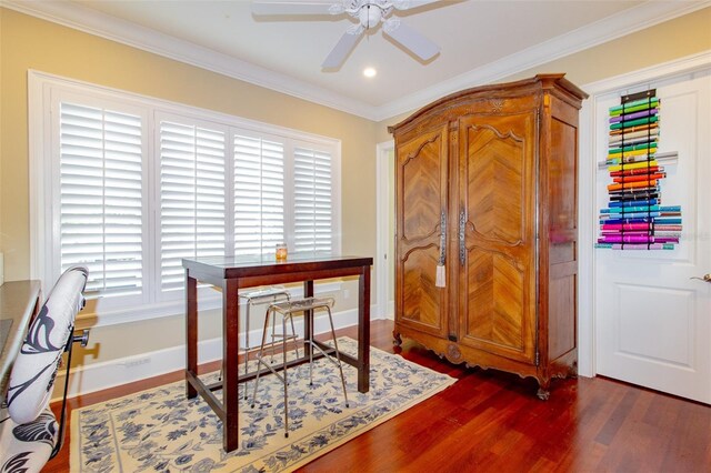 office space with plenty of natural light, dark hardwood / wood-style flooring, and crown molding