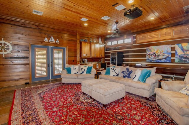 living room with french doors, hardwood / wood-style flooring, ceiling fan, and wooden ceiling