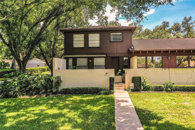 view of front of home with a front yard