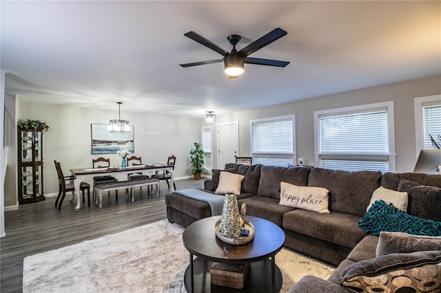 living room featuring ceiling fan, plenty of natural light, and hardwood / wood-style floors