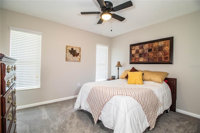 bedroom featuring ceiling fan and carpet flooring