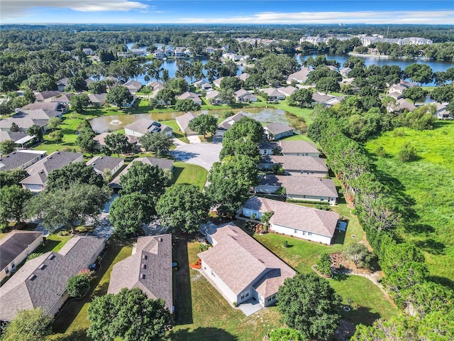 bird's eye view with a water view and a residential view