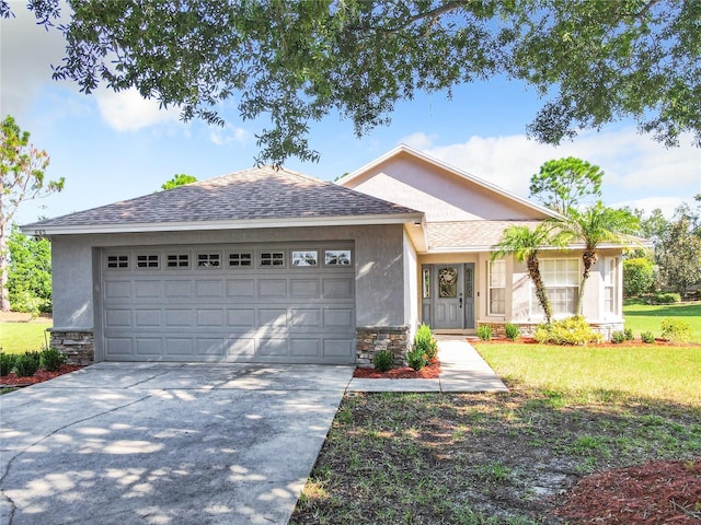 ranch-style home with a garage, stone siding, driveway, and stucco siding